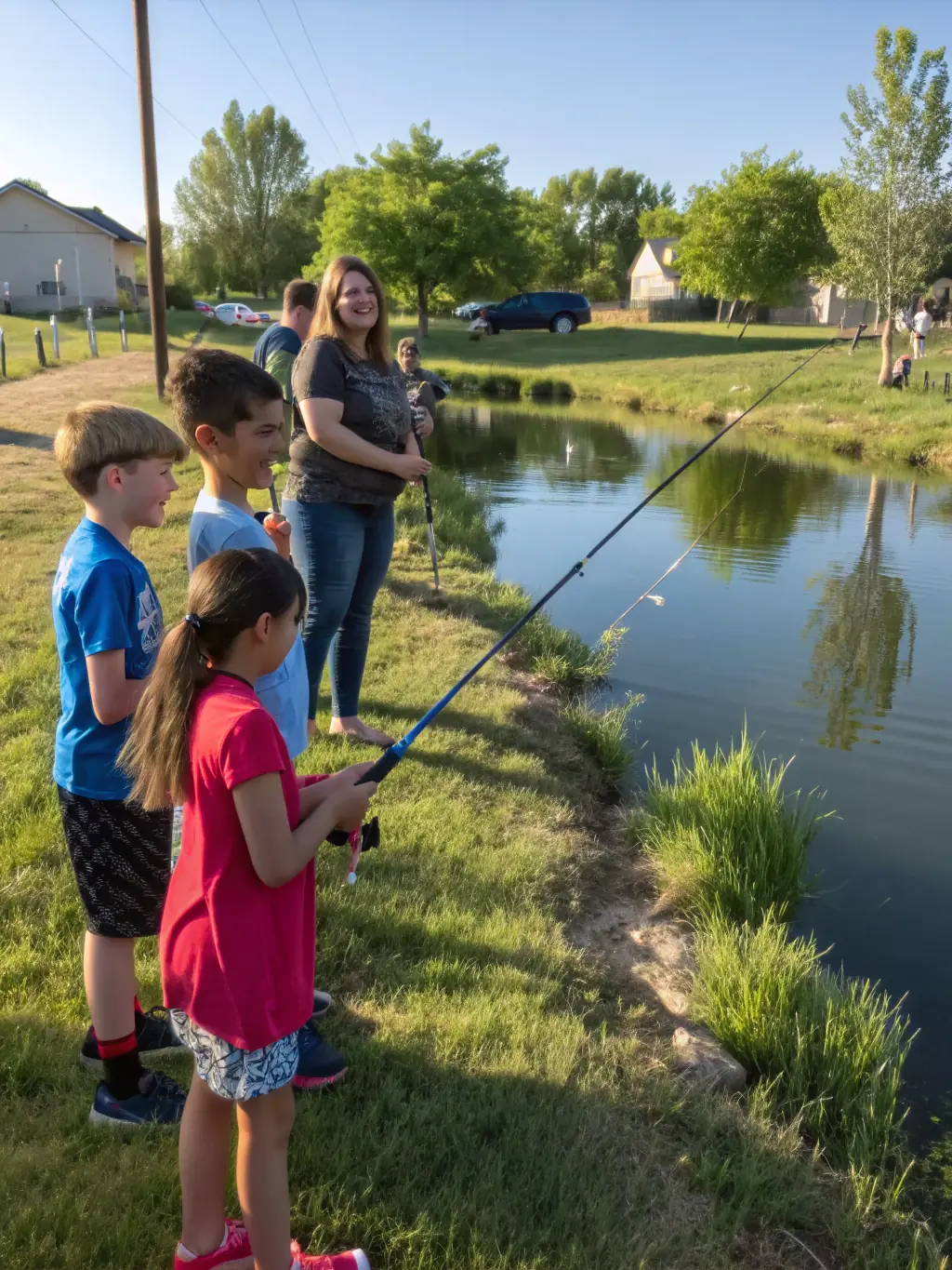 A photograph of a group of children participating in a fishing workshop, highlighting the club's dedication to educating the next generation about responsible angling.